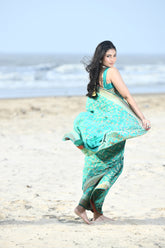 'Nazaakat'  Green Pure Resham Cotton Alfi Jaal Tilfi Border Pure Banarasi Handloom Saree